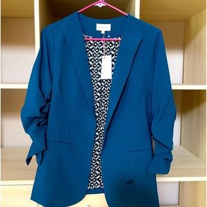 Size small Skies are blue blazer jacket with fringe sleeves